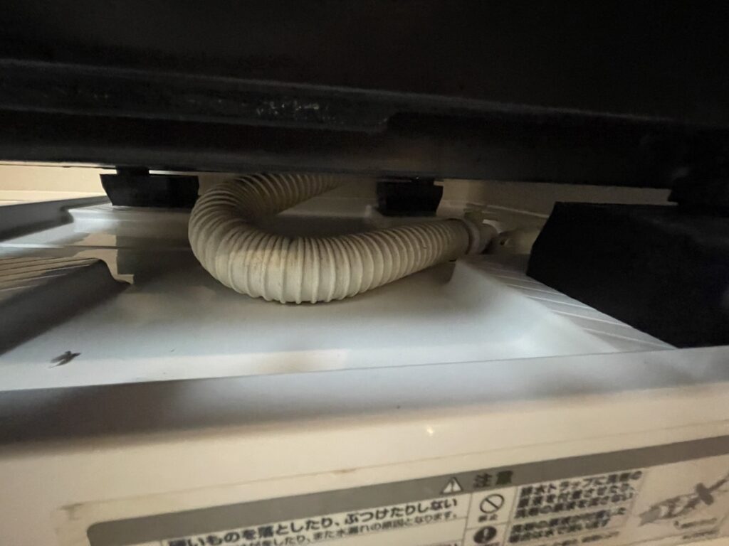 アクアドラム式洗濯機「E12」排水詰まり修理！専門業者の作業実績を紹介します