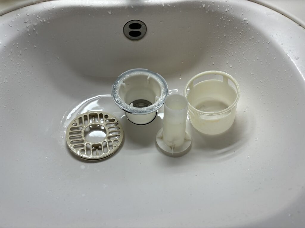 アクアドラム式洗濯機「E12」排水詰まり修理！専門業者の作業実績を紹介します